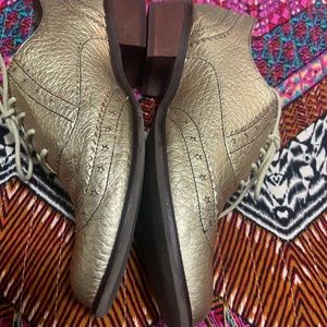 Gold Latigo oxfords…